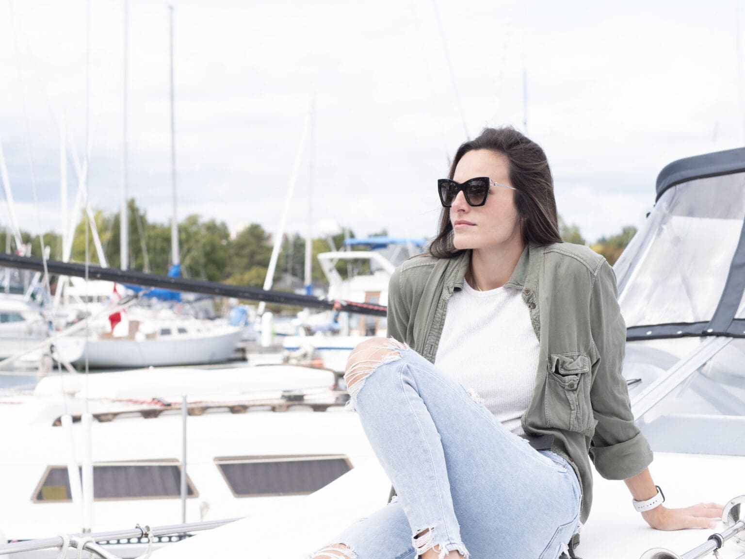 Girl Wearing Sunglasses On Boat in Thunder Bay